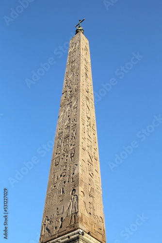 ancient Egyptian column at Piazza del Popolo in Rome, Italy 
