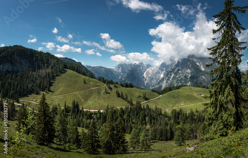 Berglandschaft Panorama mit Blick zur wolkenverhangenen Watzmannfrau und Watzmann am Hochbahnweg auf dem Jenner photo