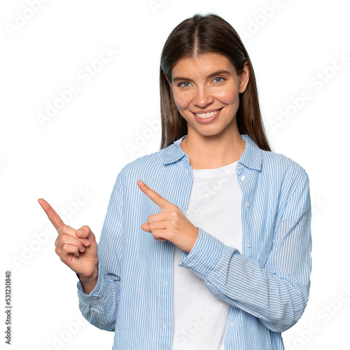 Happy positive woman pointing index fingers aside