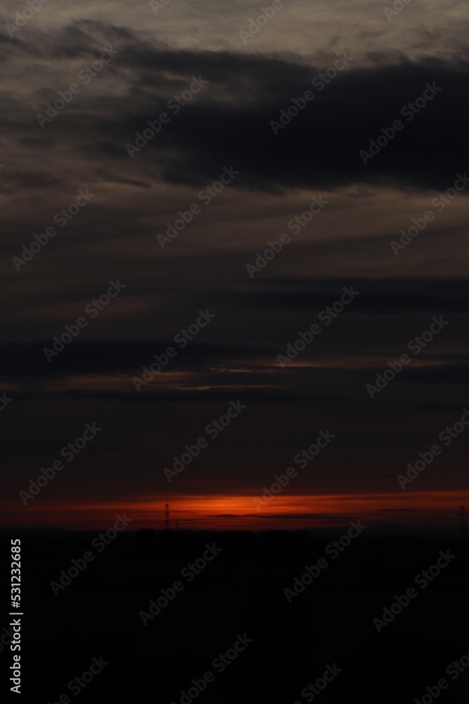 Beautiful sunset with orange and yellow clouds Beautiful sunset with orange and yellow clouds