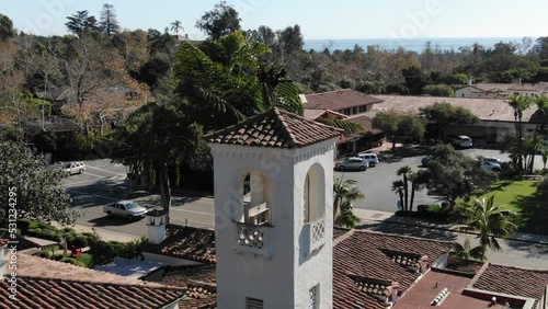 Aerial of old white bell tower in historic Montecito downtown, in Southern California photo