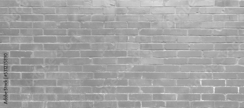 Black wall background The surface of the brick dark jagged. Abstract black wall background