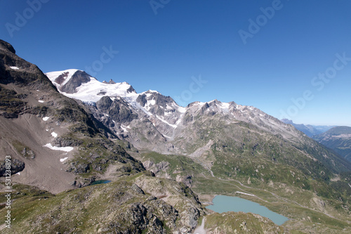 Beautiful scenic view of Stone Glacier with glacier lake at Swiss mountain pass Sustenpass on a sunny summer day. Photo taken July 13th, 2022, Susten Pass, Switzerland.