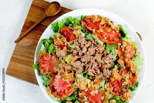 Garden salad with tomato lettuce and tuna