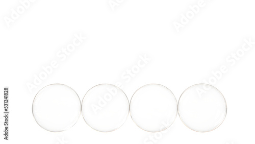 four glass spheres isolated and transparent 3D illustration rendering