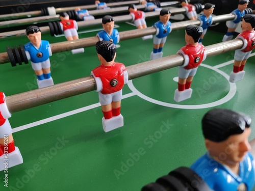 Arcade table soccer with tools for playing for office and home games. © Ismail Sadiron