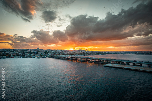 sunset over the harbor and bosphorus strait in Istanbul - Turkey 