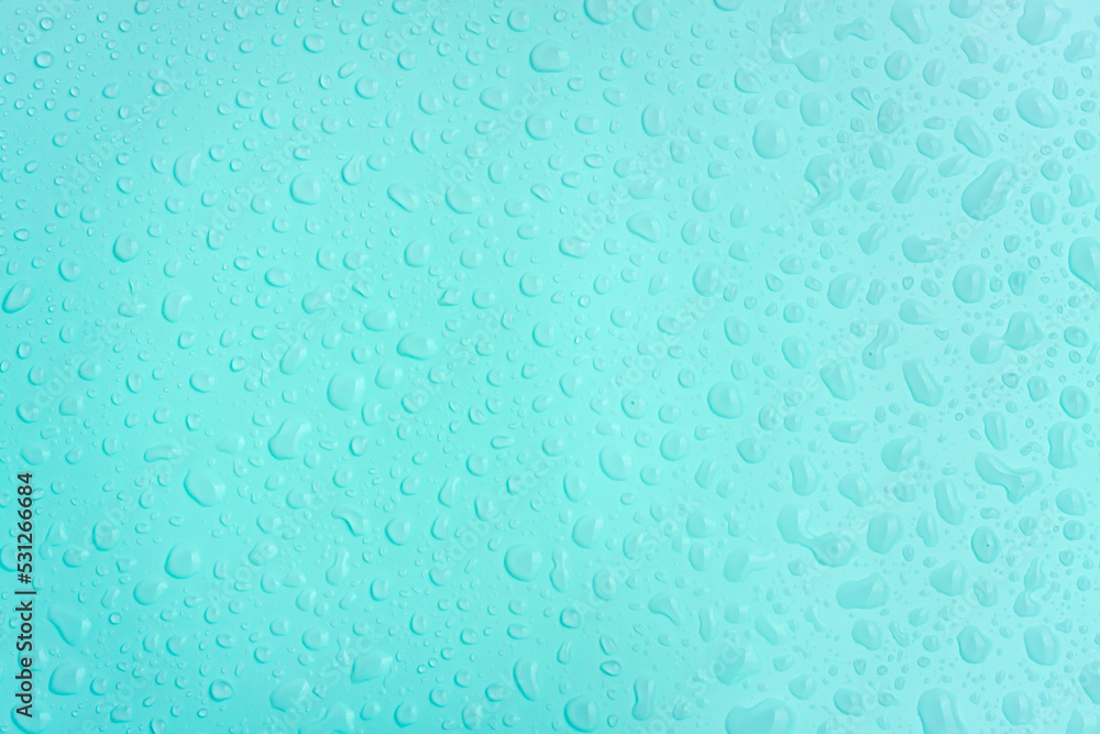 Water drops on blue pastel color background Water drops on blue pastel color background