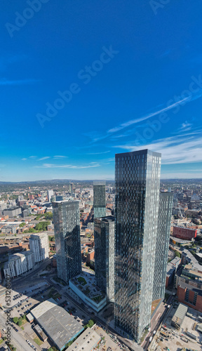 Fotografering Manchester City Centre Drone Aerial View Above Building Work Skyline Construction Blue Sky Summer Beetham Tower Deansgate Square Glass Towers
