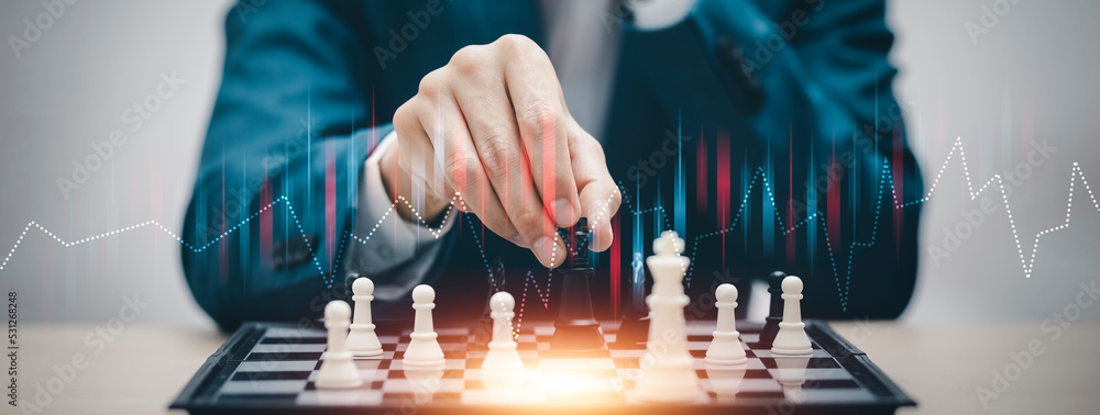 Business strategy competitive ideas concept, Chess game on chess board  behind business background. Business present financial and marketing  strategy analysis. Investment target in global economy . Business Images