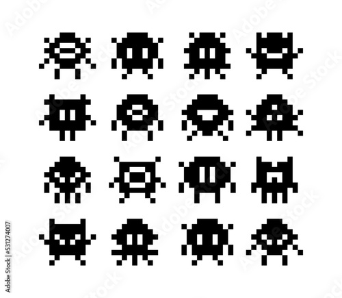 Abstract funny Monsters icons in Pixel Art style. Vintage 8-bit pixel graphics monster silhouette. Retro video games icons. Simple aliens character set © VRTX