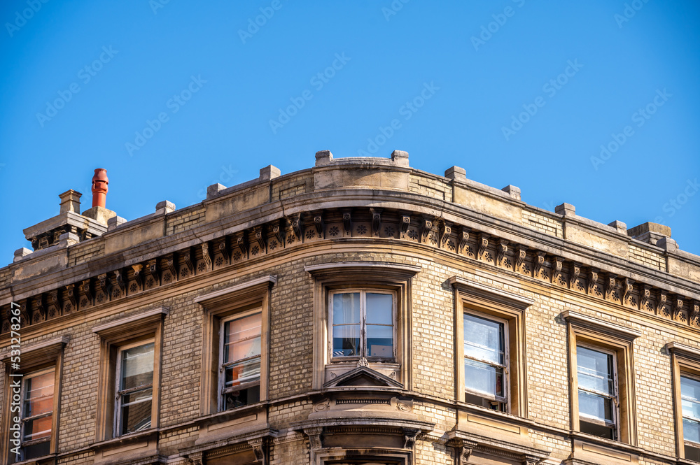 Traditional brick architecture of buildings in London, the UK's grand capital.