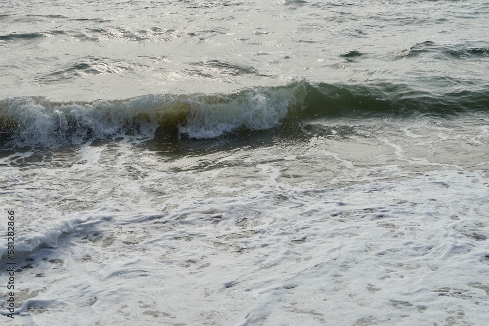 Waves on the beach. Power of sea waves in the coastal seashore of Mahabalipuram beach, Tamilnadu, India. Waves on the beach. Power of sea waves in the coastal seashore of Mahabalipuram beach, Tamilnadu, India.