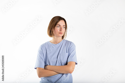 Upset and depressed young woman feeling bad isolated on white background
