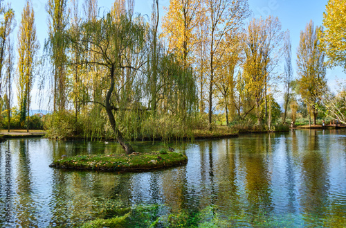 autumn in the lake inside the park called fonti del clitunno in umbria, italy