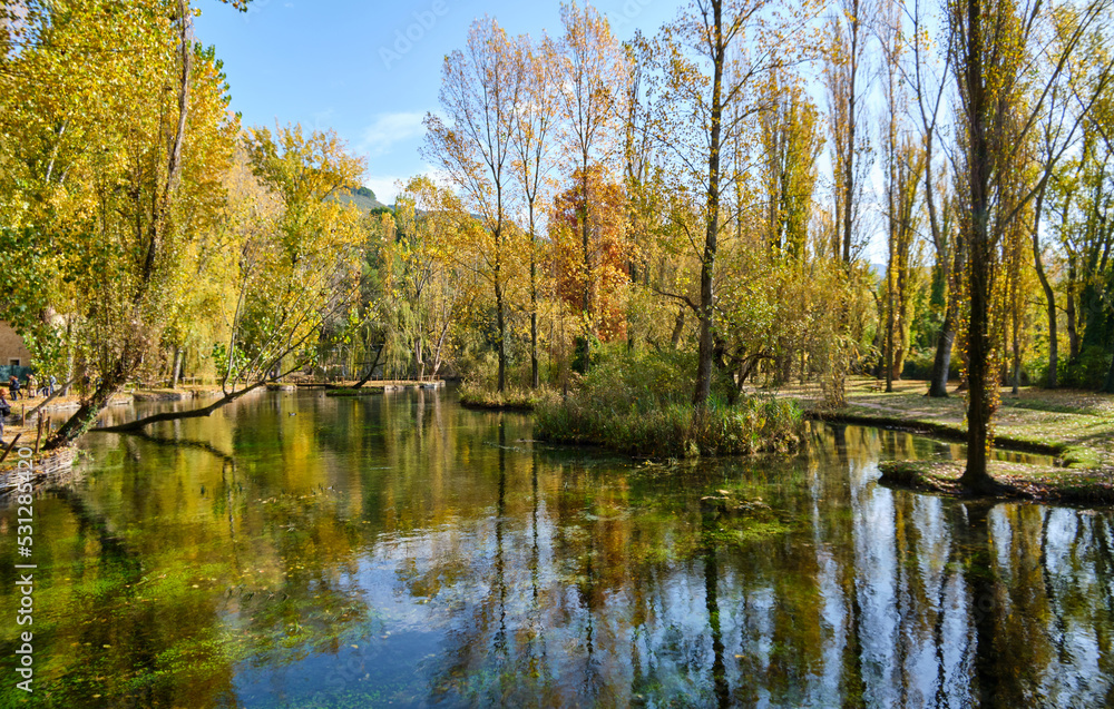 autumn in the lake inside the park called fonti del clitunno in umbria, italy autumn in the lake inside the park called fonti del clitunno in umbria, italy