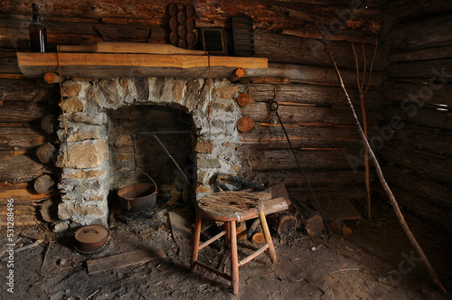 fireplace inside old trappers cabin photo