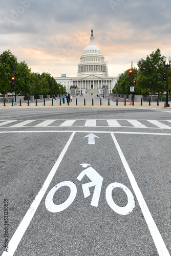 Capitol Building and bike road sign as seen in sunset - Washington DC United States