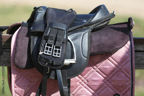 Close up of a sport horse saddle. Quality classical leather saddle