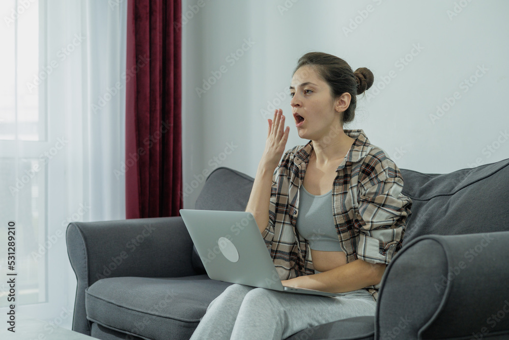 Close-up of a girl using a laptop. In your free time. Learning online. Network communication. Close-up of a girl using a laptop. In your free time. Learning online. Network communication.