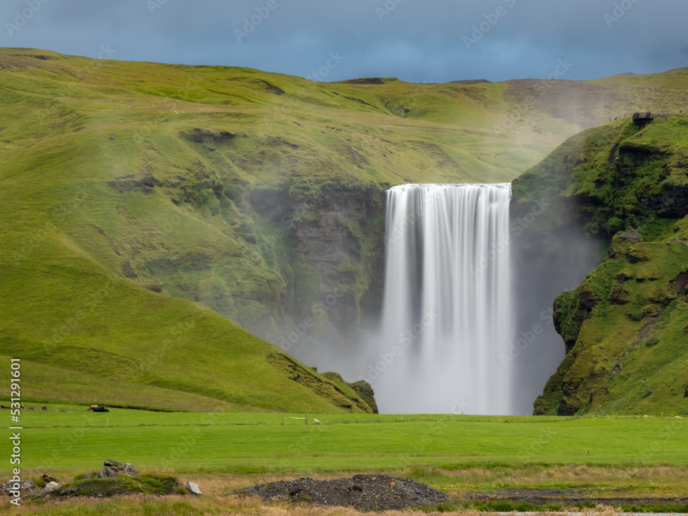 Fototapeta premium Skógafoss waterfall on the Skógá River in the south of Iceland at the cliff marking the former coastline.