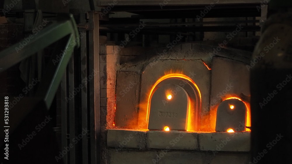 Fototapeta premium Roaring furnace in glassworks factory, Murano, Venice, Italy