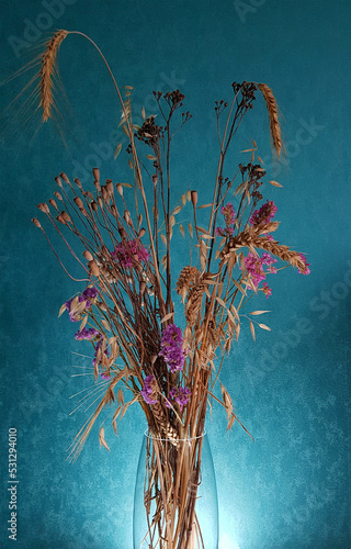 bouquet wheat with wildflowers on dark turquoise background wallpaper