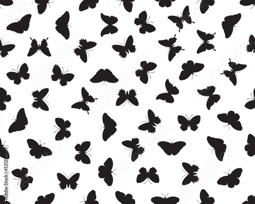 Seamless pattern with black silhouettes of butterflies on white background	