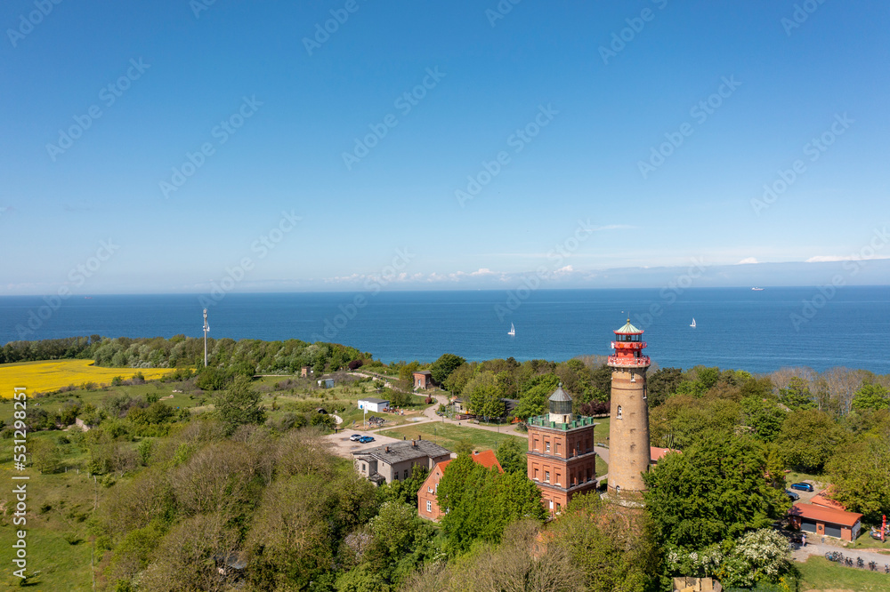 The island Ruegen Germany with many rape fields and lighthouse