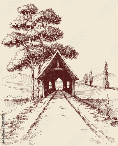 Railway and old wooden train tunnel bridge in the alpine landscape