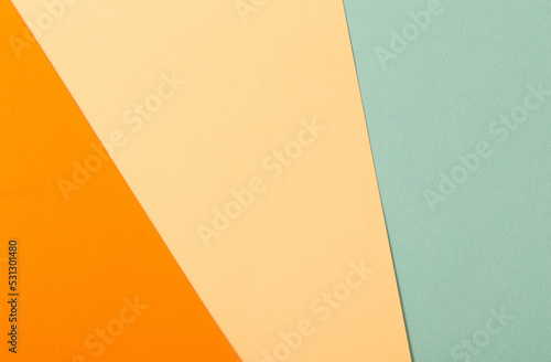 multi-colored paper background from several sheets of cardboard