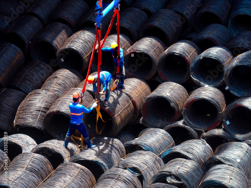 Top view of wire rods in coils stowage into cargo hold of the vessel, Stevedore to prepare for discharging steel wire rod from cargo hold of the vessel.