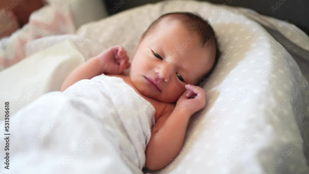 baby newborn. little baby a newborn 1 month of life lies in bed in the maternity hospital. happy family kid dream concept. close-up baby indoors. beautiful cute girl lies lifestyle at home baby newborn. little baby a newborn 1 month of life lies in bed in the maternity hospital. happy family kid dream concept. close-up baby indoors. beautiful cute girl lies lifestyle at home