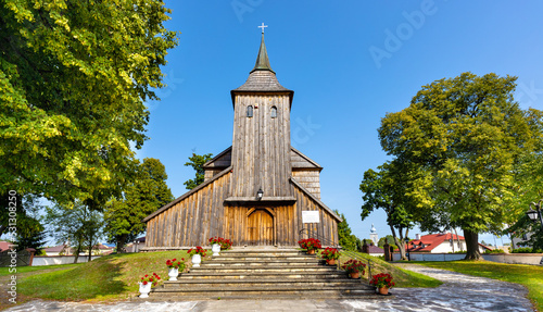 Historic XVII century wooden church of Our Lord Transfiguration in Cmolas village near Mielec in Podkarpacie region of Poland photo