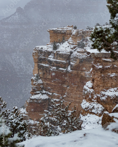 A cliff standing in the snow