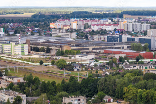 aerial panoramic view from a great height of a small provincial town with a private sector and high-rise apartment buildings