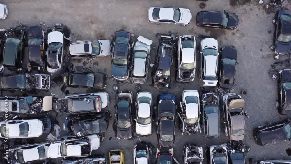 Aerial view of junkyard with discarded broken cars. Recycling of old vehicles, 4k Aerial view of junkyard with discarded broken cars. Recycling of old vehicles, 4k