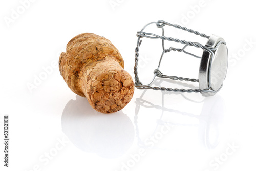 Cork from a bottle of champagne or sparkling wine, close-up photo of a cork isolated on a white background.