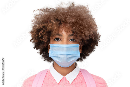 Close-up studio portrait of african american school girl or college student with curly afro hair wearing medical mask, isolated © Damir Khabirov