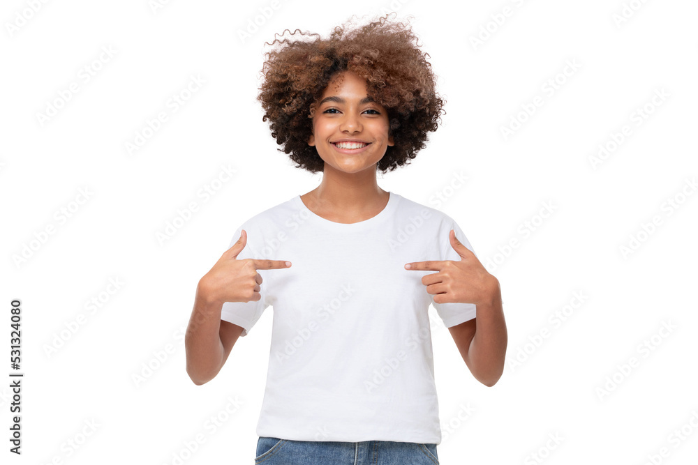 Smiling african girl pointing at her blank white tshirt with both index fingers, copy space for your ads, isolated Smiling african girl pointing at her blank white tshirt with both index fingers, copy space for your ads, isolated