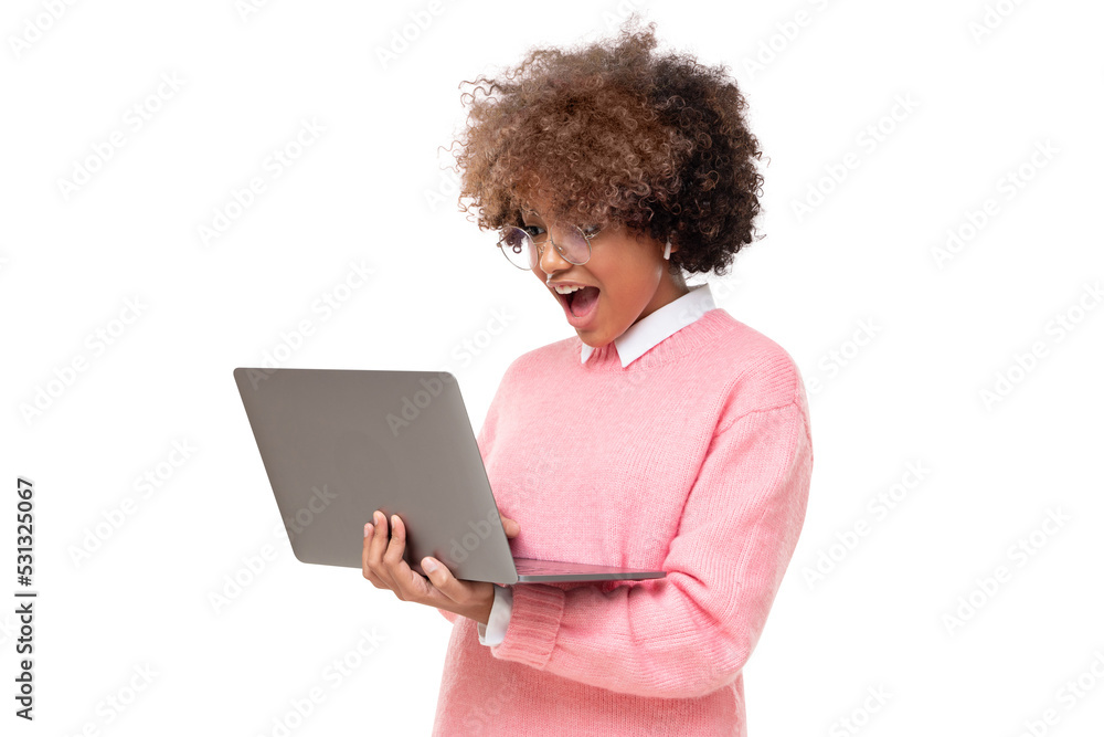 Studio portrait of surprised african american student teen girl, holding laptop with wow emotion, isolated Studio portrait of surprised african american student teen girl, holding laptop with wow emotion, isolated