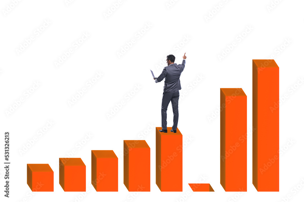 Businessman in growth concept with bar charts Businessman in growth concept with bar charts