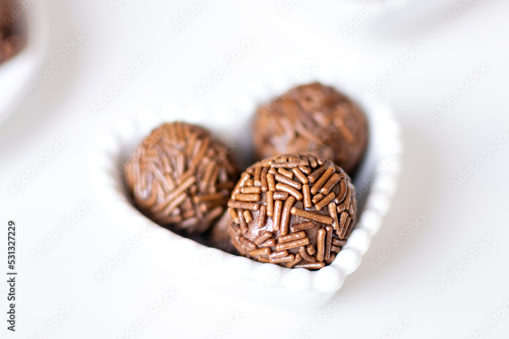 Three brigadiers in a heart-shaped bowl