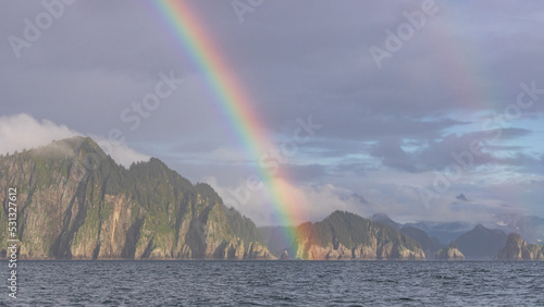 Double Rainbow appears off the coast of Alaska near Kenai Fjords National Park. photo