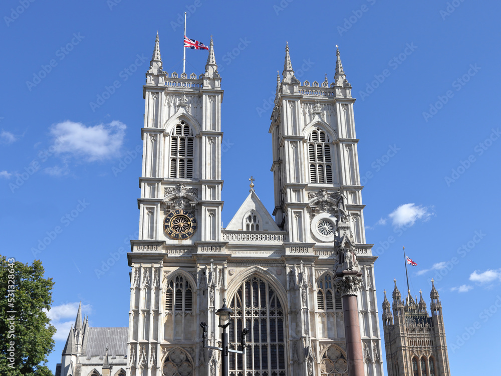 The Union Flag flying half-mast on the Westminster Abbey and Victoria Tower in London, UK