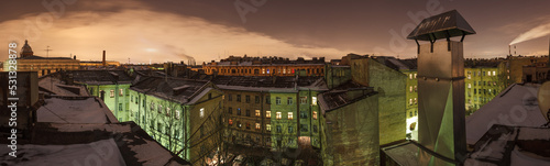 Foto Night panorama of roofs and courtyards of St
