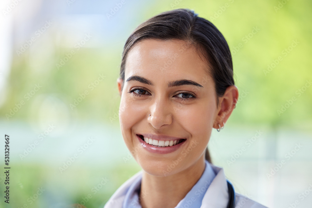 Face, smile and happy woman inside on a green background with a positive attitude of motivation and success. Portrait of an attractive, young and happy female standing on a blurred backdrop Face, smile and happy woman inside on a green background with a positive attitude of motivation and success. Portrait of an attractive, young and happy female standing on a blurred backdrop