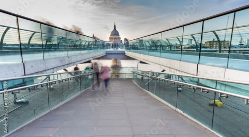 Entrance ramp to and from Millennium Bridge at dusk, pedestrian walkway, Central London,England,UK. photo