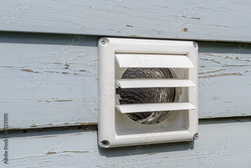 Plastic Dryer Exhaust Vent with Open Flaps While Dryer is On