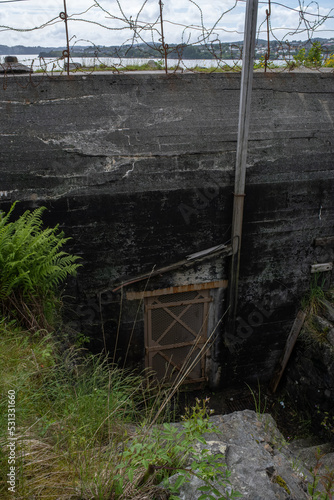 Bergen, Norway - June 14, 2022:  Tellevik coastal fort is a German coastal fort from World War II, built on Klauvaneset in Asane. Much of the work was carried out by Russian prisoners. Selective focus photo